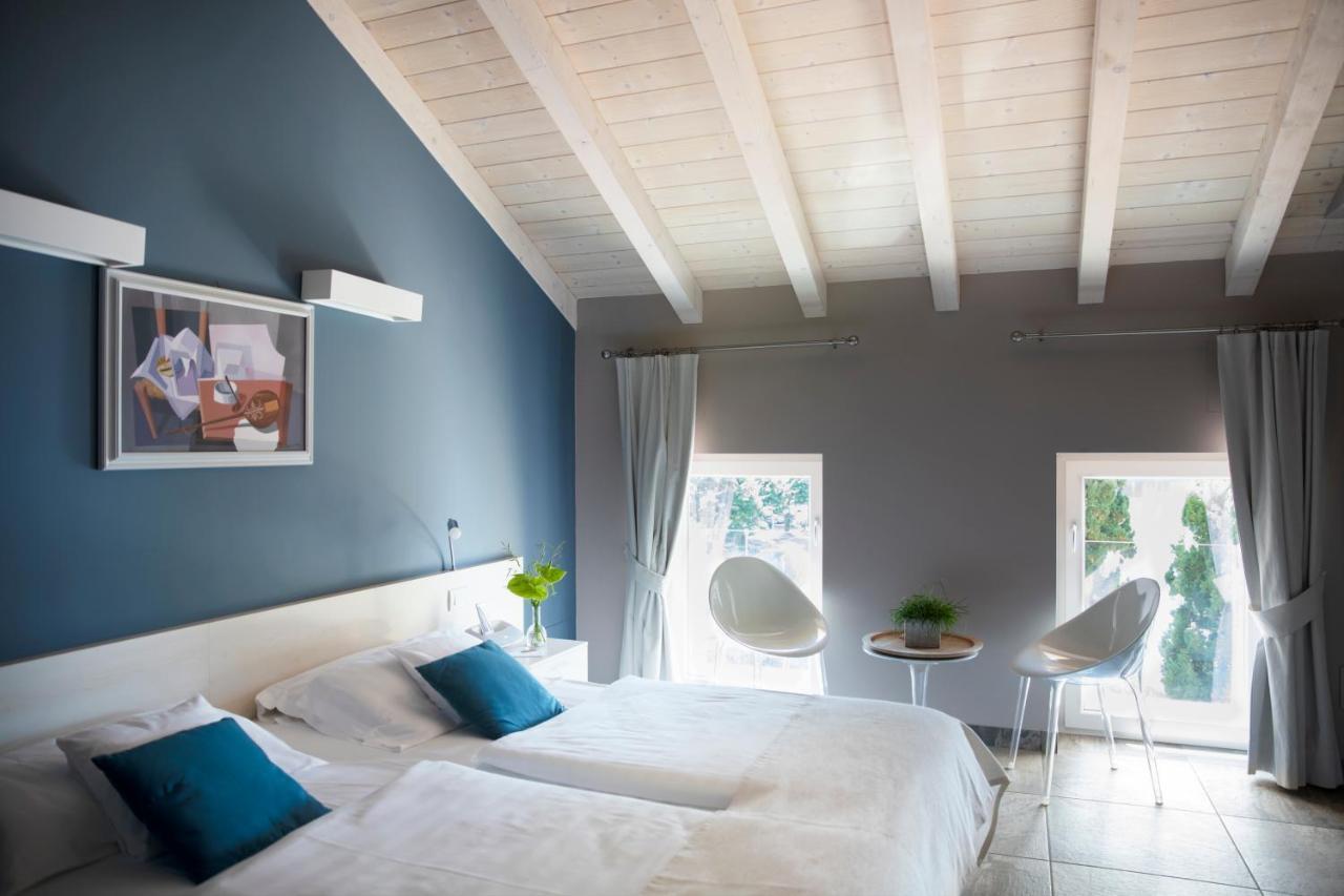 Camin Hotel Colmegna Luino Esterno foto
