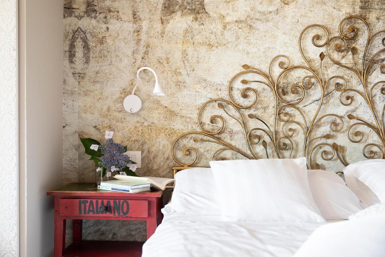Camin Hotel Colmegna Luino Esterno foto