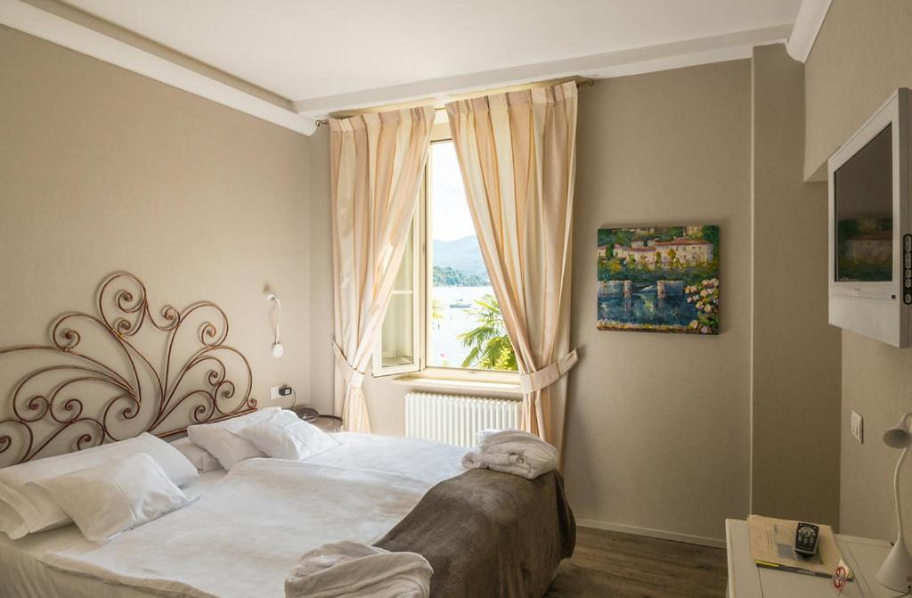 Camin Hotel Colmegna Luino Esterno foto