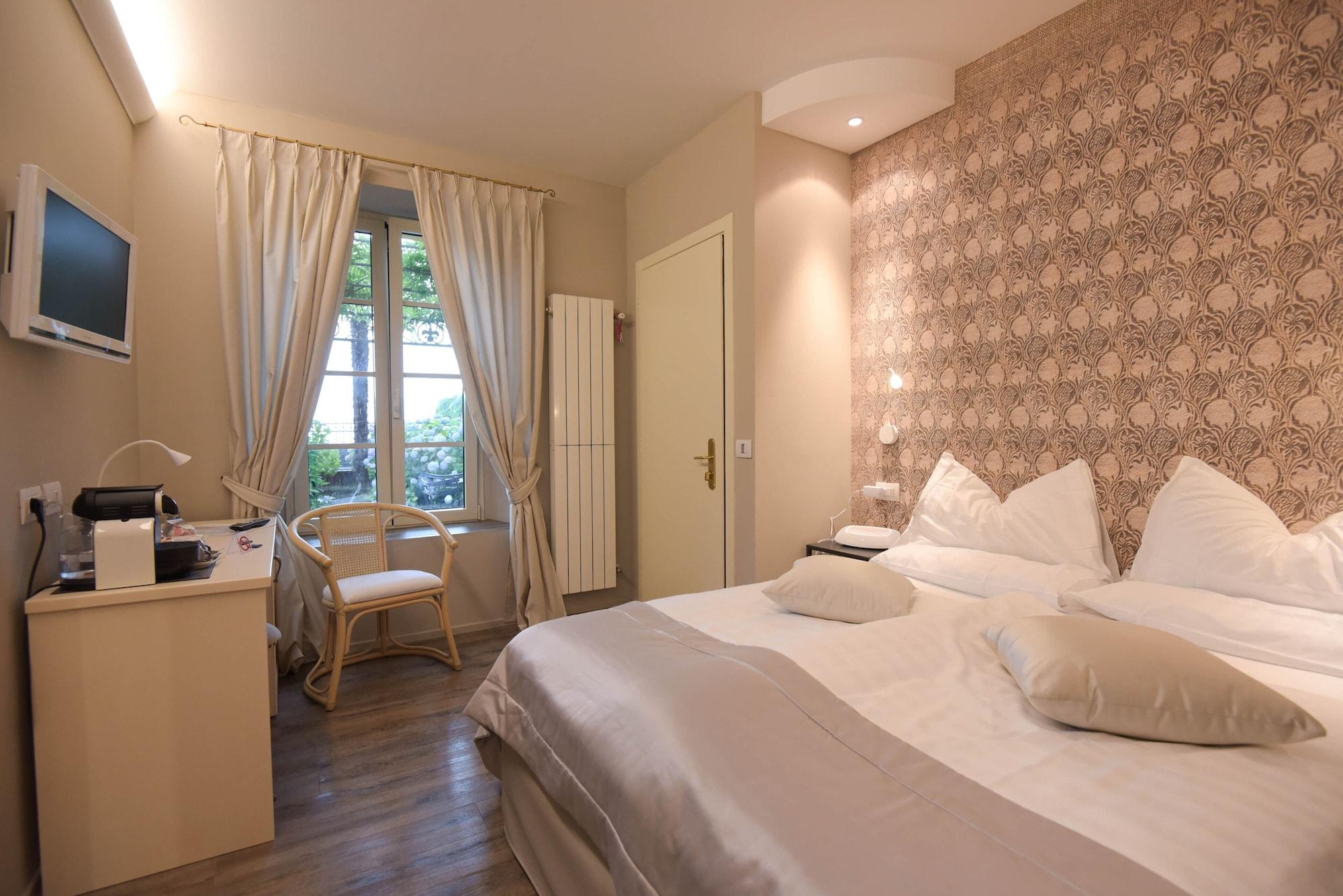 Camin Hotel Colmegna Luino Esterno foto