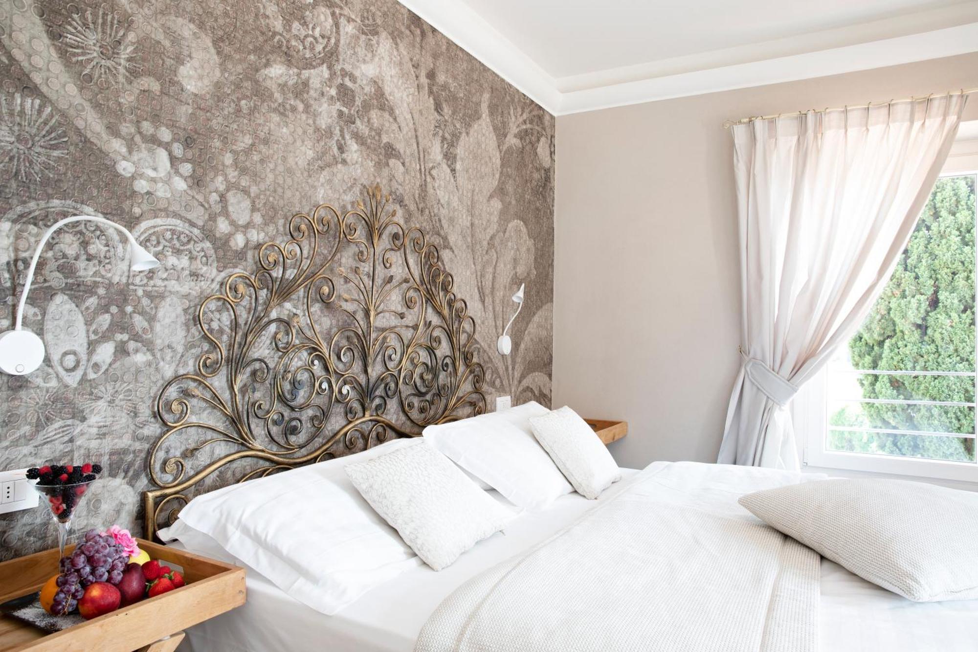 Camin Hotel Colmegna Luino Esterno foto