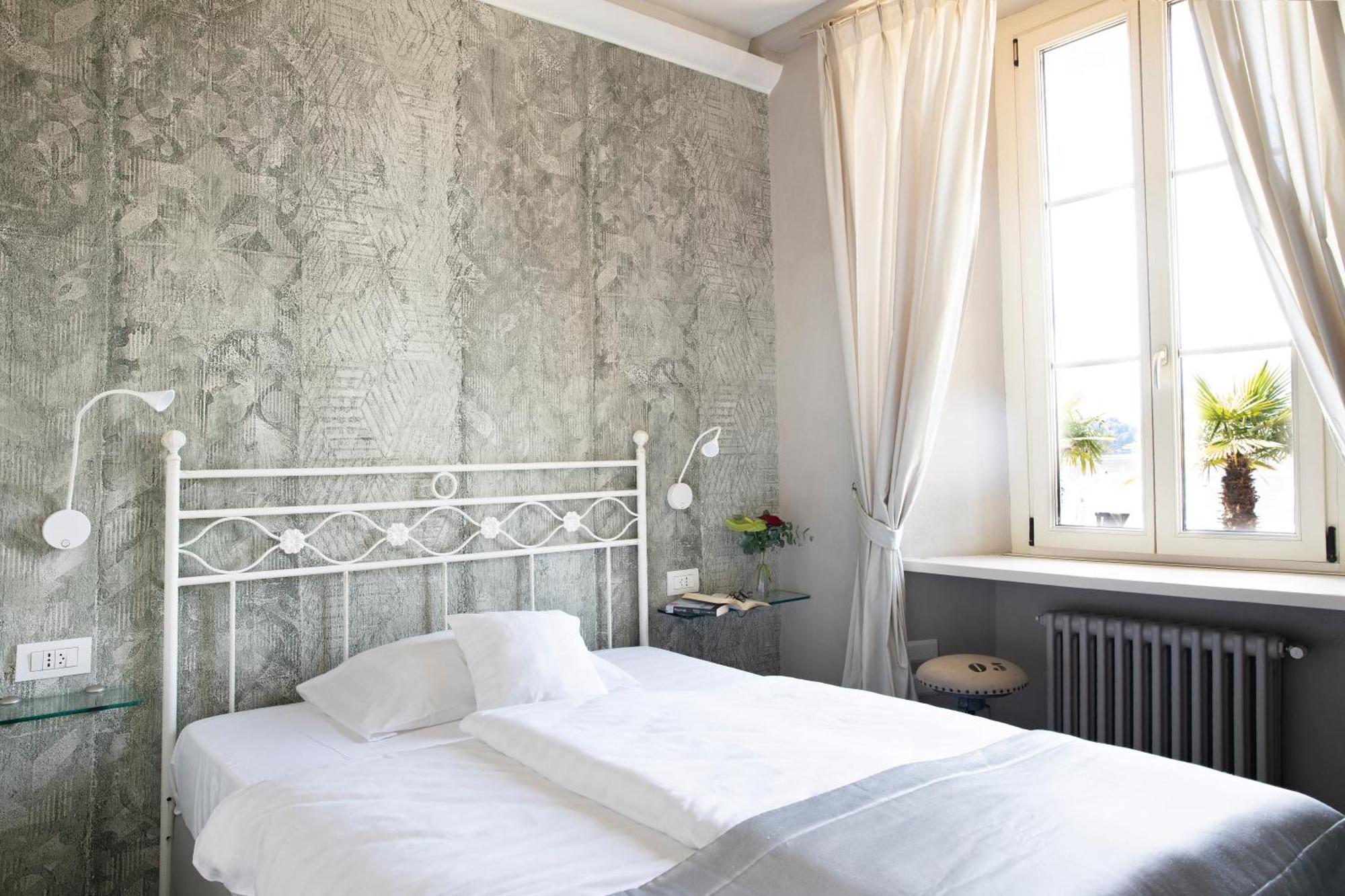 Camin Hotel Colmegna Luino Esterno foto