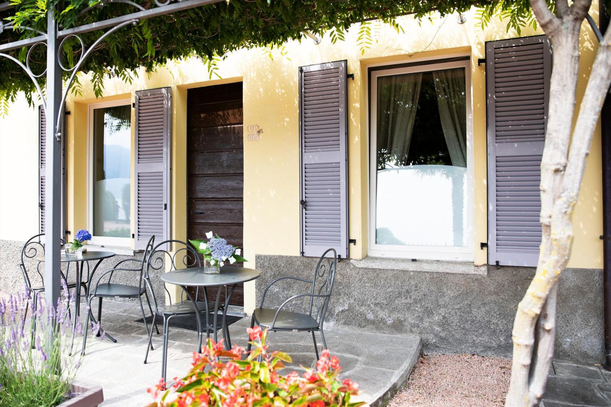 Camin Hotel Colmegna Luino Esterno foto