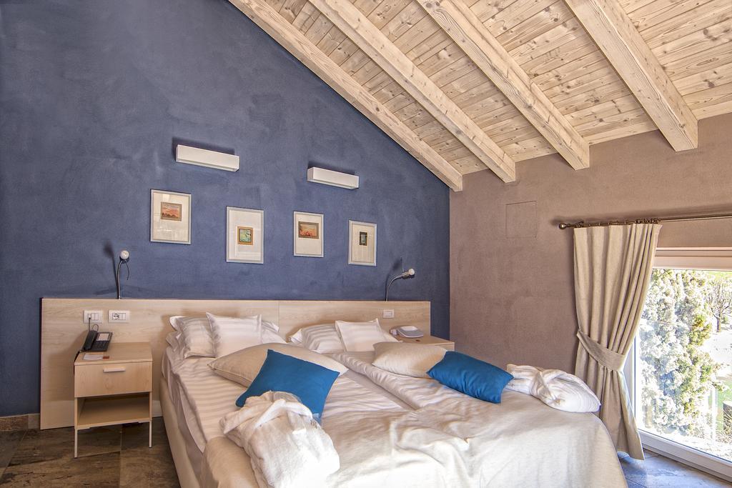 Camin Hotel Colmegna Luino Esterno foto