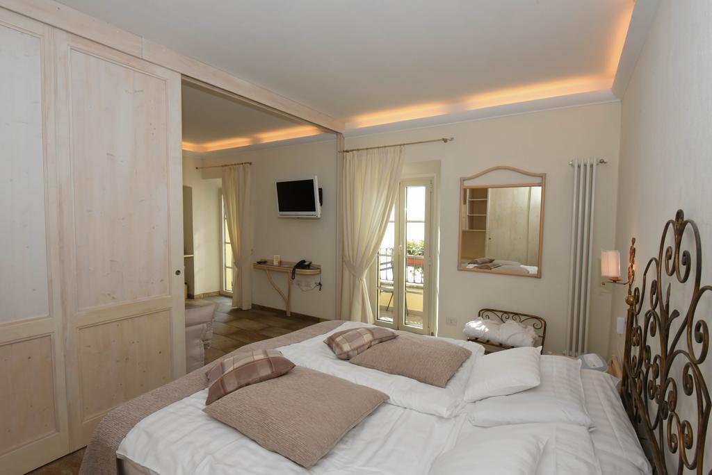 Camin Hotel Colmegna Luino Esterno foto