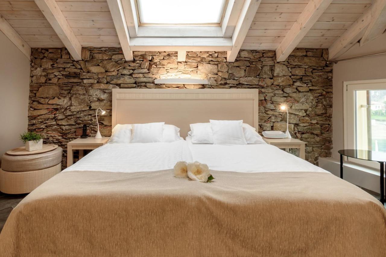 Camin Hotel Colmegna Luino Esterno foto